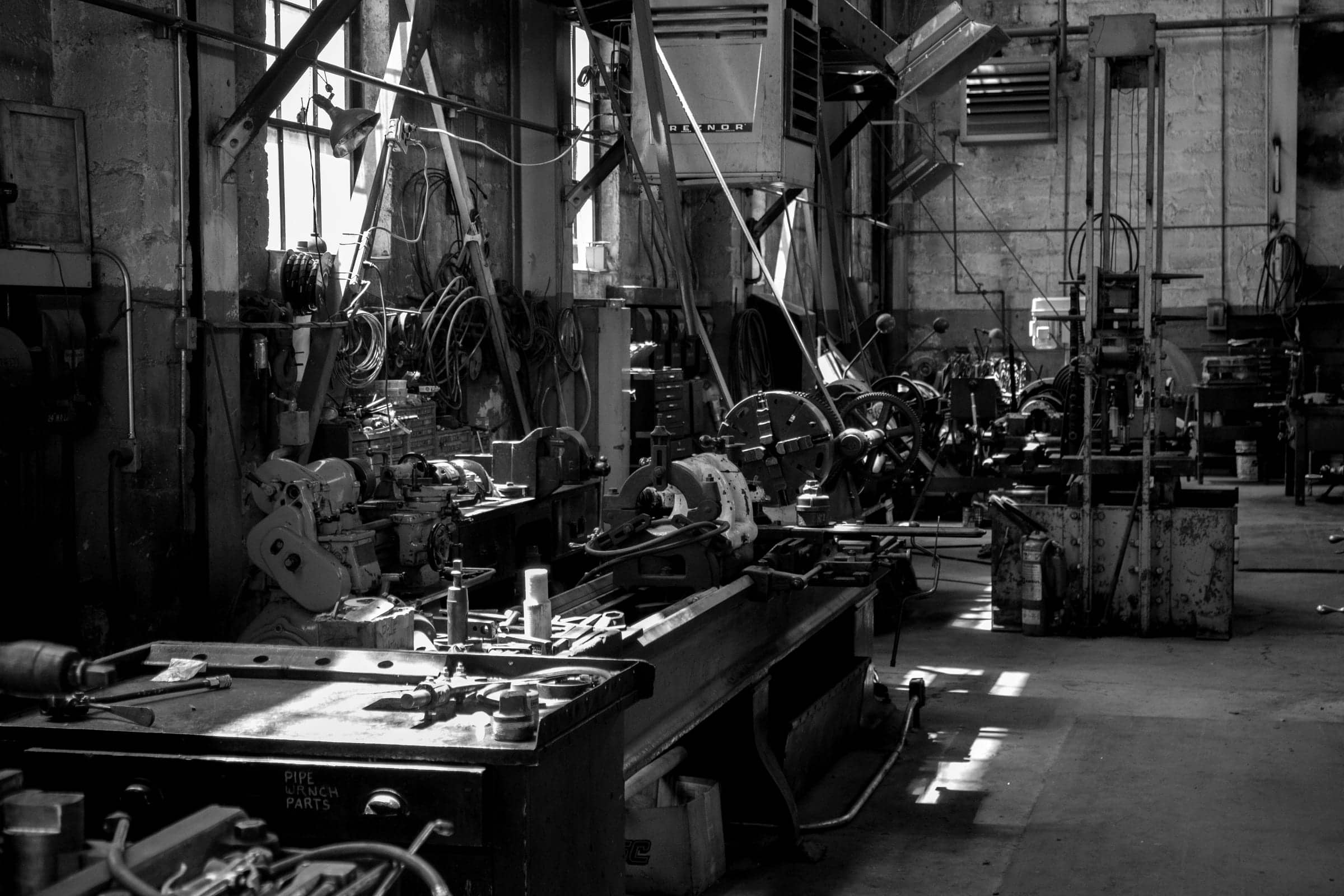 Engineering machine shop with lathes and workbenches