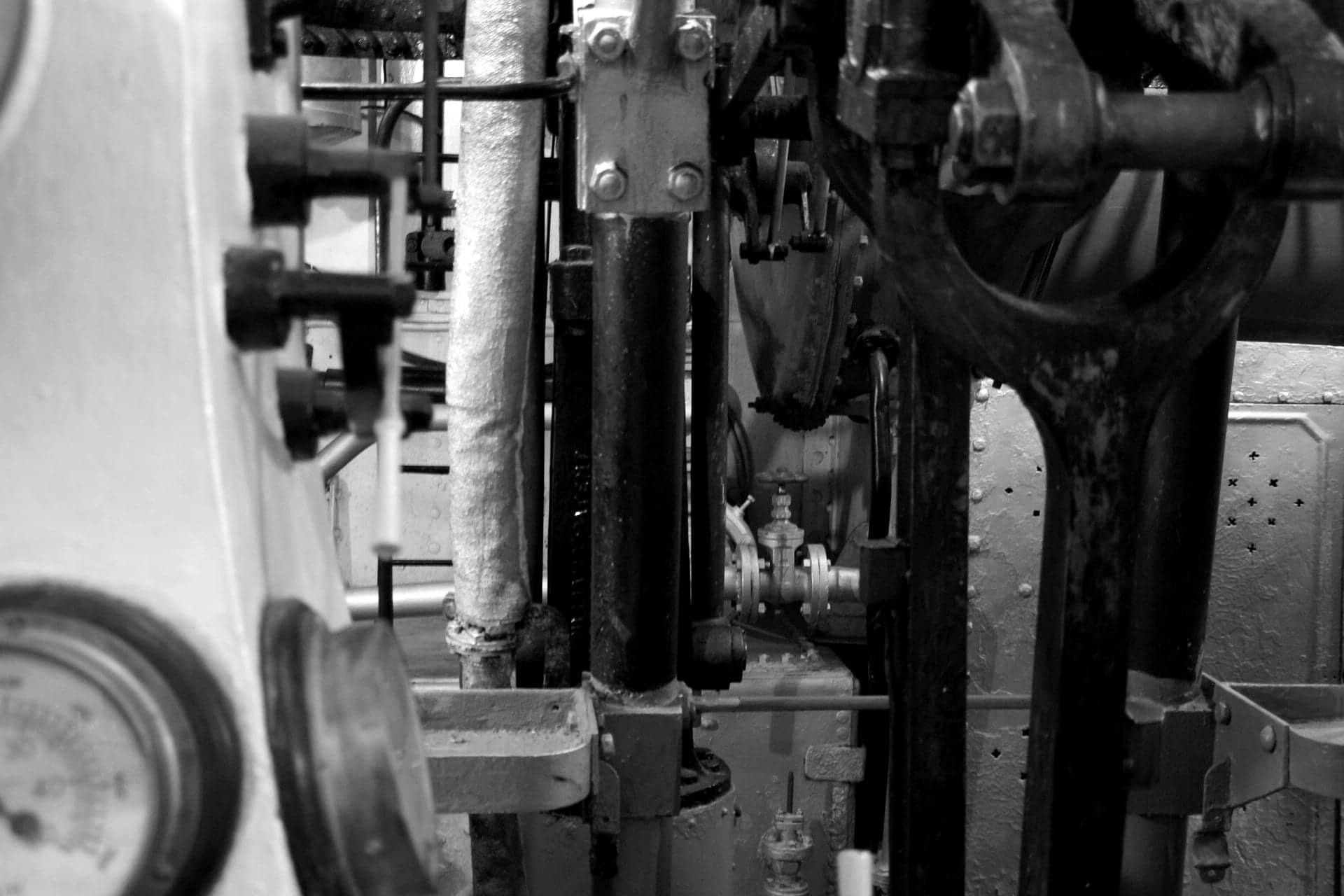 Engine room machinery with gauges and valve gear